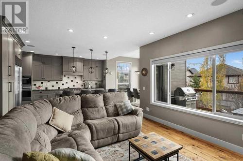 View of the main level from the living room - 209 Hidden Creek Road Nw, Calgary, AB - Indoor Photo Showing Living Room