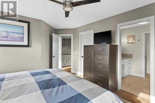 Primary bedroom - 209 Hidden Creek Road Nw, Calgary, AB - Indoor Photo Showing Bedroom