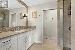 The spa inspired 3-piece ensuite features heated flooring and a dedicated water closet - 