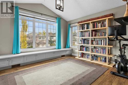 Upper level bonus room with vaulted ceilings.. - 209 Hidden Creek Road Nw, Calgary, AB - Indoor