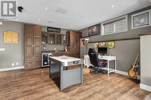 Custom built wet bar with cabinetry - 209 Hidden Creek Road Nw, Calgary, AB - Indoor