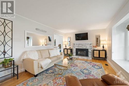 818 Vinette Crescent, Ottawa, ON - Indoor Photo Showing Living Room With Fireplace