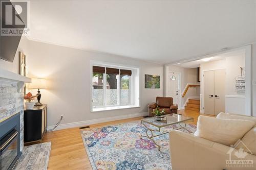 818 Vinette Crescent, Ottawa, ON - Indoor Photo Showing Living Room With Fireplace