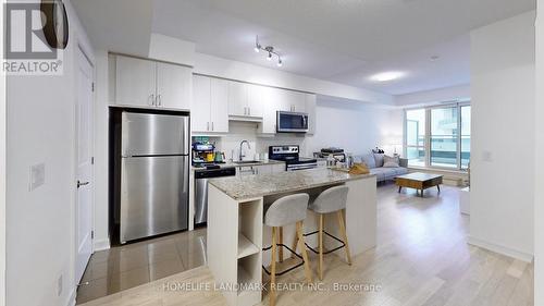 707 Sw - 9191 Yonge Street, Richmond Hill, ON - Indoor Photo Showing Kitchen With Stainless Steel Kitchen