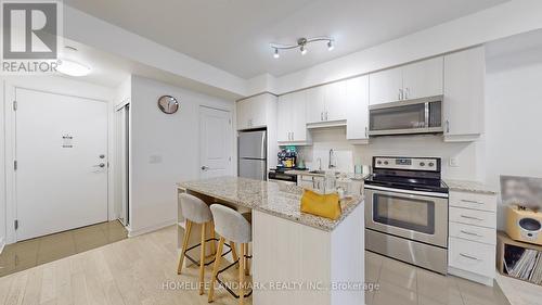 707 Sw - 9191 Yonge Street, Richmond Hill, ON - Indoor Photo Showing Kitchen With Stainless Steel Kitchen