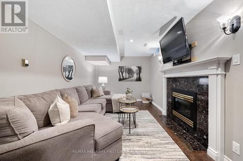 62 Deverell Street, Whitby, ON - Indoor Photo Showing Living Room With Fireplace