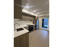 W22X 10828 139A Street, Surrey, BC  - Indoor Photo Showing Kitchen With Upgraded Kitchen 