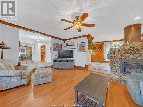 607 County Rd 2, Lakeshore, ON - Indoor Photo Showing Living Room With Fireplace