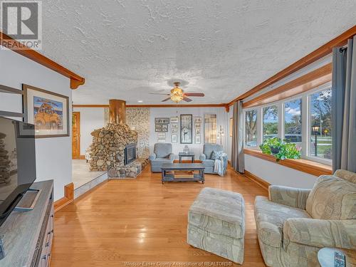 607 County Rd 2, Lakeshore, ON - Indoor Photo Showing Living Room With Fireplace