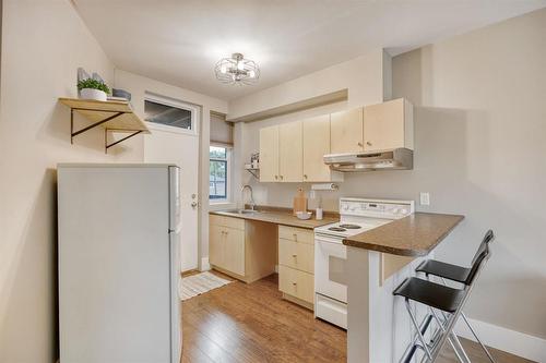 5 52 Fawcett Avenue, Winnipeg, MB - Indoor Photo Showing Kitchen With Double Sink