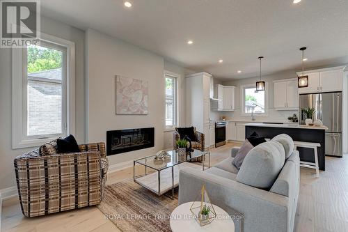 58 - 383 Daventry Way, Middlesex Centre (Kilworth), ON - Indoor Photo Showing Living Room With Fireplace