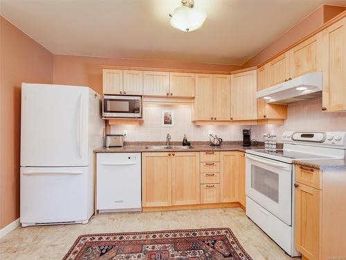 201-920 Park Blvd, Victoria, BC - Indoor Photo Showing Kitchen With Double Sink