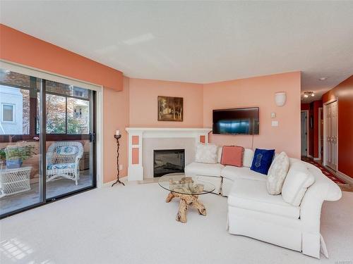 201-920 Park Blvd, Victoria, BC - Indoor Photo Showing Living Room With Fireplace