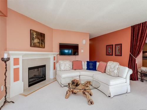 201-920 Park Blvd, Victoria, BC - Indoor Photo Showing Living Room With Fireplace