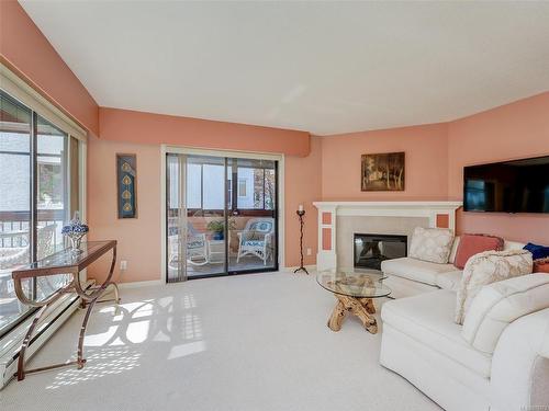 201-920 Park Blvd, Victoria, BC - Indoor Photo Showing Living Room With Fireplace