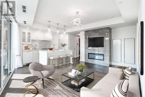 404 - 2060 Lakeshore Road, Burlington, ON - Indoor Photo Showing Living Room With Fireplace