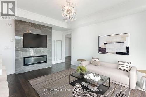 404 - 2060 Lakeshore Road, Burlington, ON - Indoor Photo Showing Living Room With Fireplace