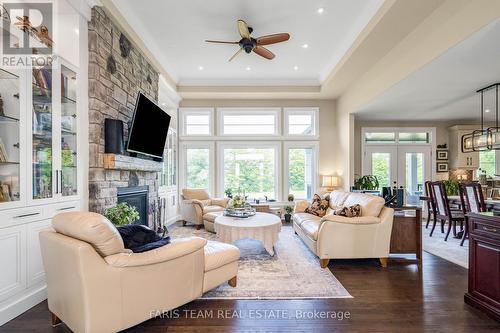 4454 North Valley Lane, Severn, ON - Indoor Photo Showing Living Room With Fireplace