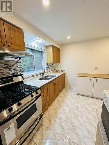 56 Crockamhill Drive, Toronto, ON - Indoor Photo Showing Kitchen With Double Sink