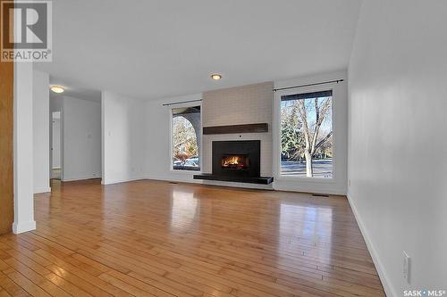 58 Marquis Crescent, Regina, SK - Indoor Photo Showing Living Room With Fireplace