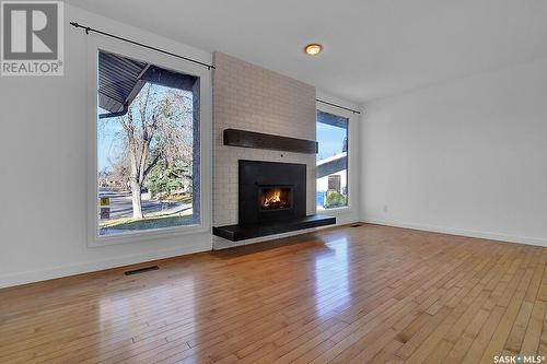 58 Marquis Crescent, Regina, SK - Indoor Photo Showing Living Room With Fireplace