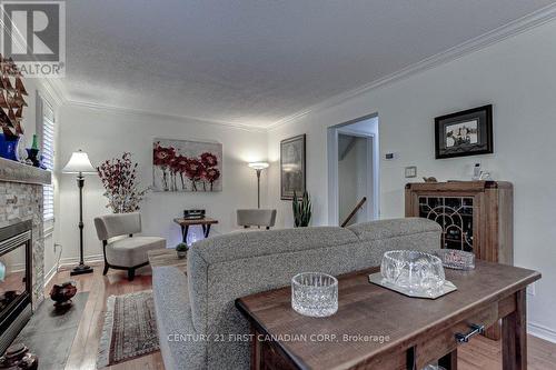 2 - 340 Ambleside Drive, London, ON - Indoor Photo Showing Living Room With Fireplace