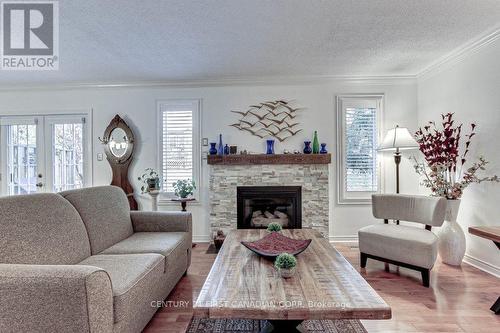 2 - 340 Ambleside Drive, London, ON - Indoor Photo Showing Living Room With Fireplace