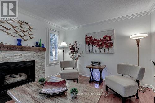 2 - 340 Ambleside Drive, London, ON - Indoor Photo Showing Living Room With Fireplace