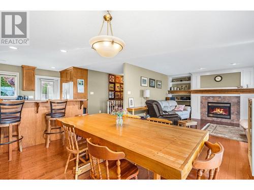 1095 Mt. Fosthall Drive, Vernon, BC - Indoor Photo Showing Dining Room With Fireplace