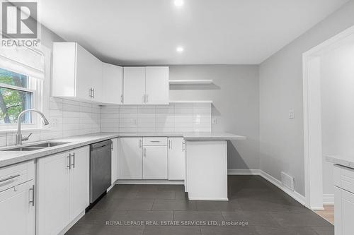 23 Hazel Street, St. Catharines, ON - Indoor Photo Showing Kitchen With Double Sink