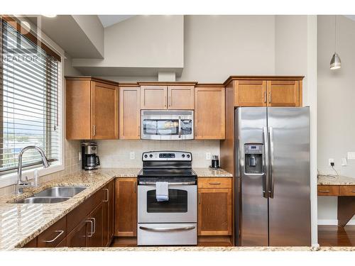 2142 Vasile Road Unit# 412, Kelowna, BC - Indoor Photo Showing Kitchen With Stainless Steel Kitchen With Double Sink