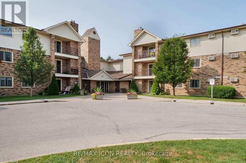 206 - 440 Wellington Street, St. Thomas, ON - Outdoor With Balcony With Facade