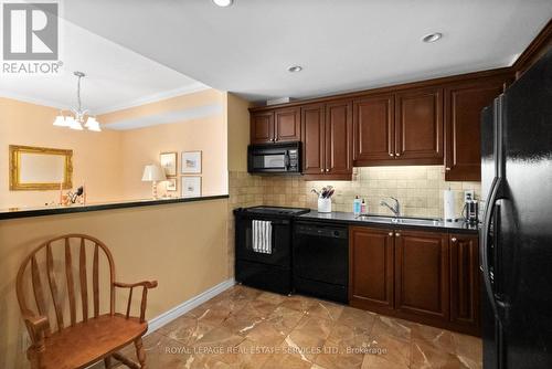 403 - 2662 Bloor Street W, Toronto, ON - Indoor Photo Showing Kitchen With Double Sink