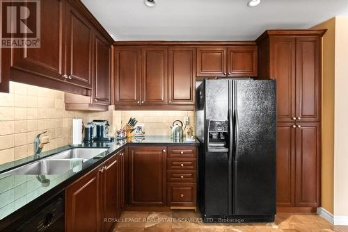 403 - 2662 Bloor Street W, Toronto, ON - Indoor Photo Showing Kitchen With Double Sink