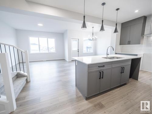 528 173 Av Ne, Edmonton, AB - Indoor Photo Showing Kitchen With Double Sink With Upgraded Kitchen