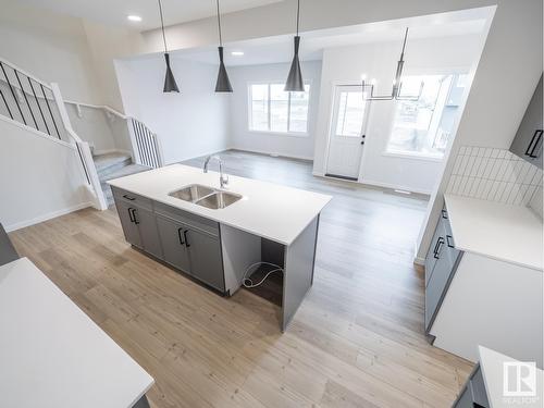 528 173 Av Ne, Edmonton, AB - Indoor Photo Showing Kitchen With Double Sink