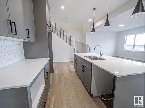 528 173 Av Ne, Edmonton, AB - Indoor Photo Showing Kitchen With Double Sink