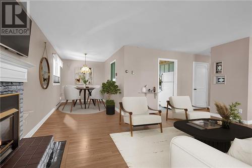 virtually staged - 1505 Second Street E, Cornwall, ON - Indoor Photo Showing Living Room With Fireplace