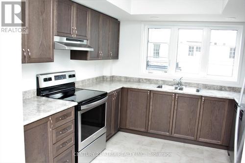 2620 Deputy Minister Path, Oshawa, ON - Indoor Photo Showing Kitchen With Stainless Steel Kitchen With Double Sink