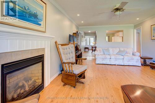 16 King'S Court, Loyalist (Bath), ON - Indoor Photo Showing Living Room With Fireplace