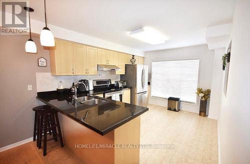 22 Exchequer Place, Toronto, ON - Indoor Photo Showing Kitchen With Double Sink