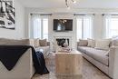 134 Yates Drive, Milton, ON  - Indoor Photo Showing Living Room With Fireplace 