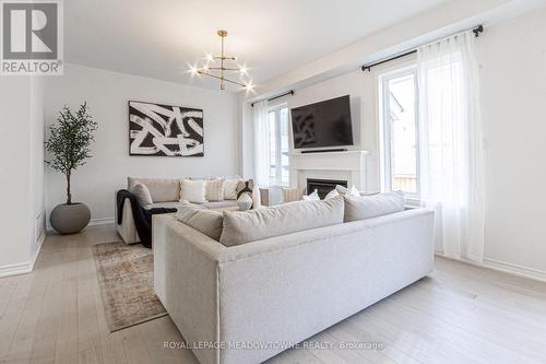 134 Yates Drive, Milton, ON - Indoor Photo Showing Living Room With Fireplace