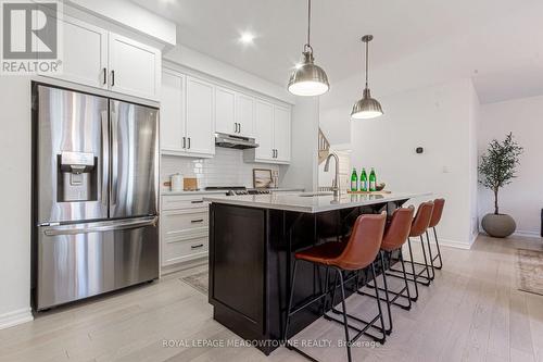 134 Yates Drive, Milton, ON - Indoor Photo Showing Kitchen With Upgraded Kitchen