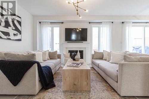 134 Yates Drive, Milton, ON - Indoor Photo Showing Living Room With Fireplace