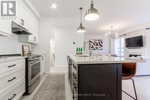 134 Yates Drive, Milton, ON - Indoor Photo Showing Kitchen With Upgraded Kitchen