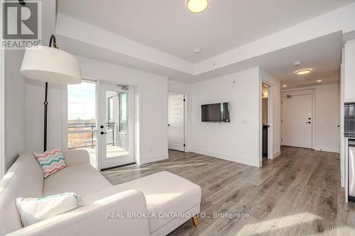 601 - 26 Lowes Road W, Guelph, ON - Indoor Photo Showing Living Room