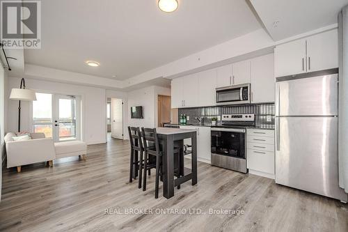 601 - 26 Lowes Road W, Guelph, ON - Indoor Photo Showing Kitchen