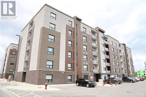 728 Brownstone Unit# 409, Lakeshore, ON - Outdoor With Balcony With Facade