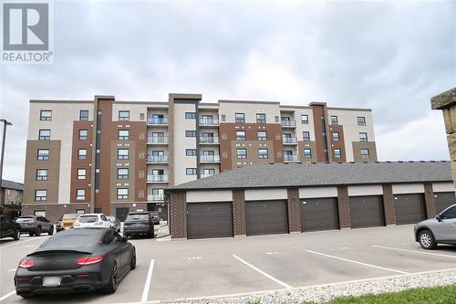 728 Brownstone Unit# 409, Lakeshore, ON - Outdoor With Balcony With Facade